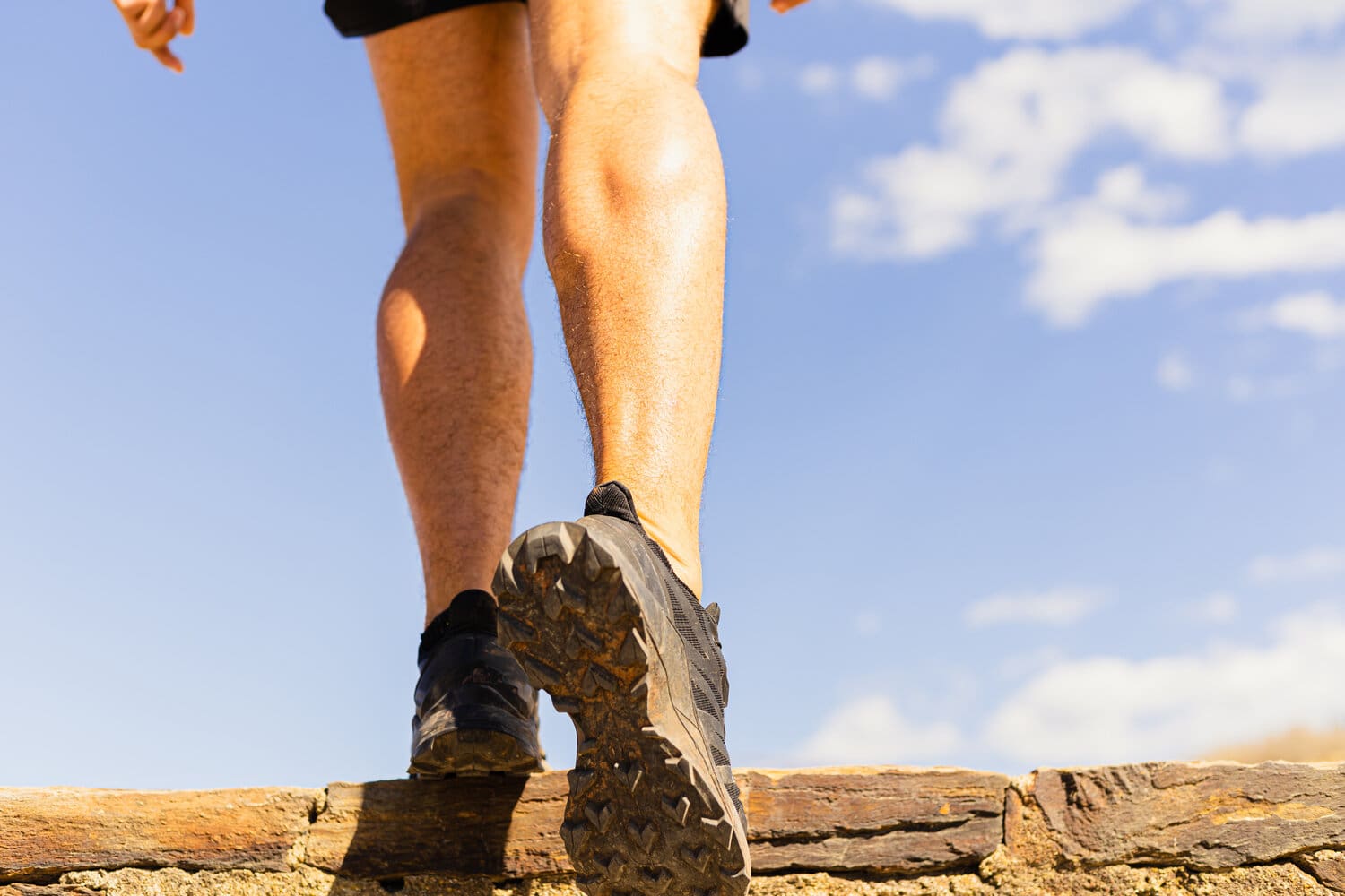 Legs,Of,A,Young,Unrecognizable,Sportsman,Going,Up,Stairs,A